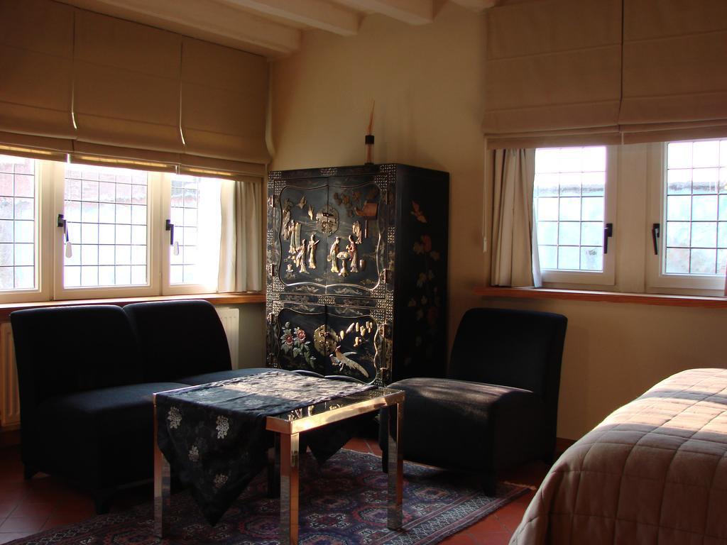 Aparthotel De Beek Anno 1410 Sint-Truiden Rom bilde